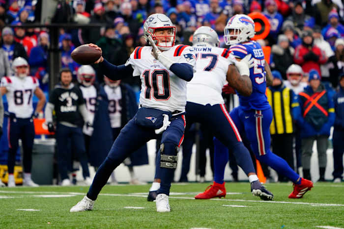 New England Patriots quarterback Mac Jones throws the ball